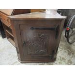 A pair of Arts & Crafts oak corner cabinets from the home of Edward Swinfen Harris (Architect)