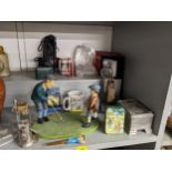 Golf related collectables to include mugs, lighters, boxes, trophies, telephone and other items