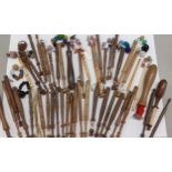 A collection of 47 nineteenth century and later lace making bobbins, some with bead decoration,