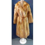 A Retro red fox full length coat with vertical leather insertions Condition: No rips, strong