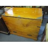 A Victorian pine twin handled trunk having a hinged top with drawer below 74cm h x 87cm w