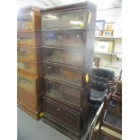 An early 20th century Globe Wernicke oak sectional bookcase, 216cm h x 86cm w Location: