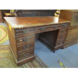 A late 19th/early 20th century walnut twin pedestal writing desk, 75cm h x 121cm w Location: