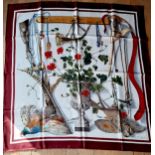 Hermes-Fleurs et Gibiers designed by Henri de Linares, a white silk scarf with brown multi borders