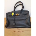 Cellerini - A black leather handbag with gold tone hardware and a branded dust bag Location: RWB