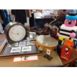 A mixed lot comprising vintage items to include a Smiths mantel clock with key, a tambourine and a