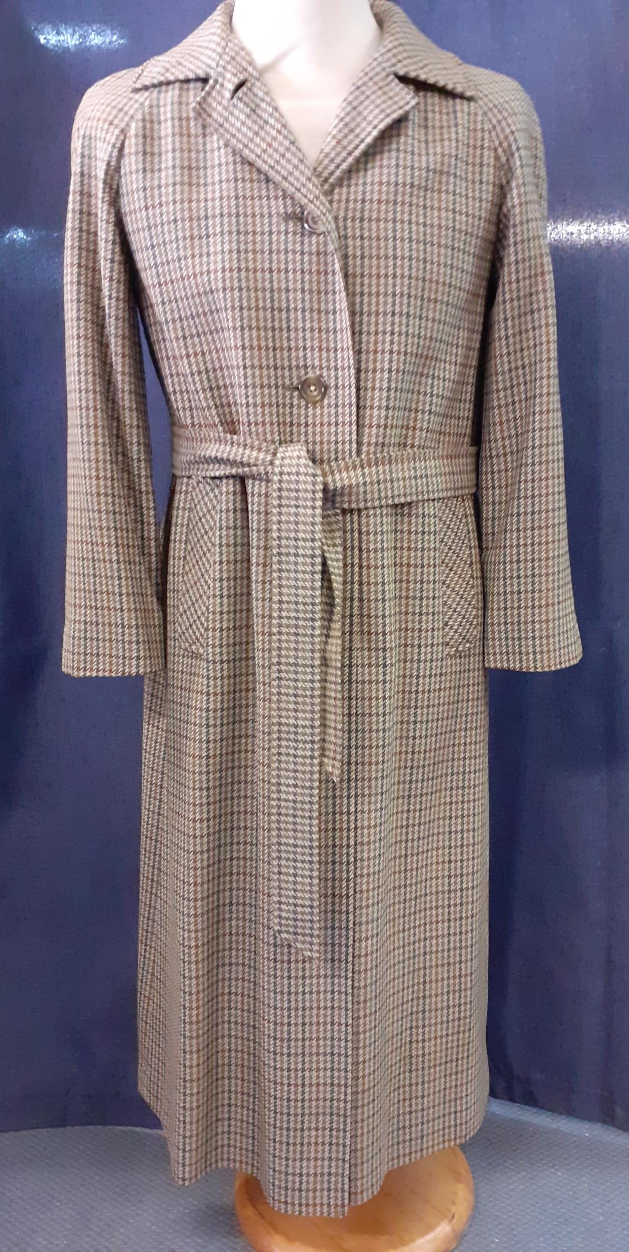 Aquascutum- A 1970's woollen coat in iconic tweed, 38" chest x 47" long, with 2 front pockets and
