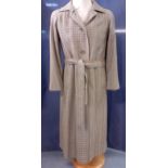 Aquascutum- A 1970's woollen coat in iconic tweed, 38" chest x 47" long, with 2 front pockets and