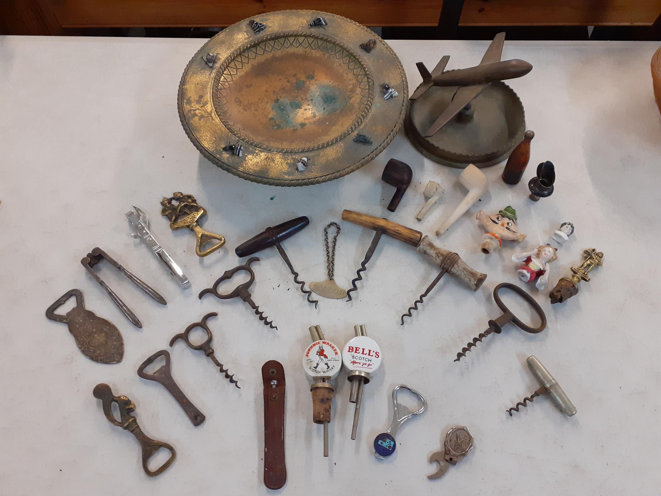 A Trench art ashtray with mounted model plane and other items of interest to include vintage cork