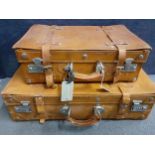 Two 1970's tan leather suitcase of small proportions, 67cm and 47cm wide Location: RAB