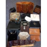 Early to mid 20th Century handbags and evening bags to include a brown crocodile handbag, French and