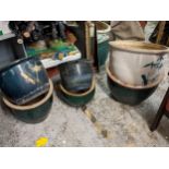 Glazed garden plant pots, some with bamboo ornament, the largest 47cm dia, Location: