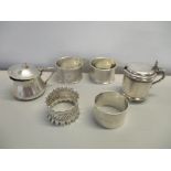 Mixed silver to include two mustard pots and four napkin rings, 148g, Location: