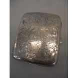 A 1920s silver cigarette case with floral engraved decoration and initials, 62.1g Location: Porters