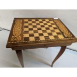 An Italian Sorrento inlaid musical games table, Location: