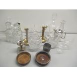 A mixed lot to include wine coasters, brass candlesticks, Waterford, pewter candlesticks, mixed