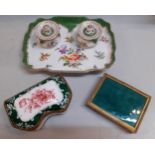 A Dresdon desk set with two ink wells, a gilded and green enamelled cigarette case and an