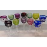 A collection of coloured overlaid hock glasses to include Bohemian examples Location: RWB