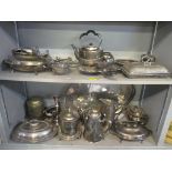 A mixed lot of silver plate to include a spirit kettle, pierced twin handled tray, entrée dishes and