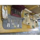 A selection of silver plated cutlery to include a part set of horn handled knives, part mother of