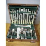 A 1930s silver plated canteen of cutlery and flatware contained in a walnut Art Deco style case,