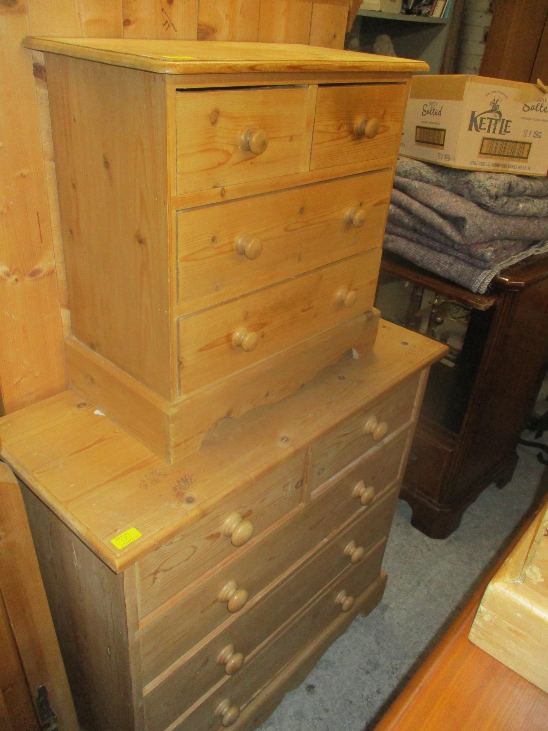 A contemporary pine side chest, twin cupboard door over three graduated drawers on bracket feet, - Image 2 of 2