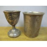 A silver beaker stamped 800 and an egg cup, Location: