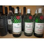 Seven bottles of mixed red wine and five bottles of Tanqueray dry gin