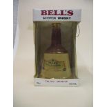 A single bottle of Bell's scotch whisky in a stoneware flask, 75cl