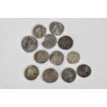 A collection of twelve Eastern/Western late Roman Empire silver Denorius/Siliqua in varying