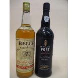 One bottle of Bells old scotch whisky 26 2/3 fl oz and a Late Bottle Vintage port 2012