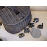 Circa 1920 a wicker Creal, a 1912 Gut cast box, a 1920s brass 2 1/2" reel and four other reels