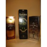 Three bottles of scotch whisky to include Chivas Regal, Glenfiddich and Mackinlays legacy