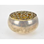 A Stuart Devlin silver potpourri bowl, London 1969, with a gilt, cast lid of irregular design, the