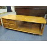 An Ercol blond elm Windsor Minerva coffee table Location:BWR