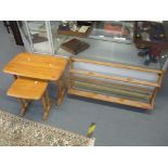 An Ercol blond elm nest of two tables together with an Ercol wall hanging shelf Location:BWR