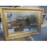 A contemporary gilt framed wall mirror with bevelled glass plate 83cm x 112cm