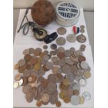 A vintage European wooden game ball, together with a vintage compass, mixed coins and other items,