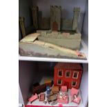 A 20th century green painted fort, a mid 20th century dolls house A/F with furniture in the
