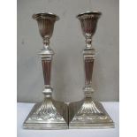 A pair of early 20th century silver candlesticks, 21.5cm h Location: