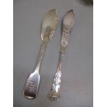 Two silver knifes to include a cake knife, 91.5g Location: