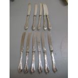 A set of eleven silver handled cake knifes A/F Location: