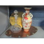 A mixed lot to include an Arts & Crafts copper hammered tray and a decanter with a silver label in
