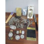 A mixed lot to include military badges, police items, fan, Ronson table lighter, cigarette case