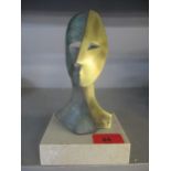 Miguel Guia (Spanish 1960) - two faced sculpture of a head, patinated bronze/brass, mounted on