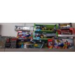 Boxed trucks and cars to include Dickie Toys, a Mini Cooper by Nikko and Country Life farm vehicles,