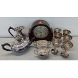 A silver plated four piece tea set, six silver plated pedestal wine goblets and an oak cased