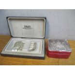 A set of six silver teaspoons and a silver clad lid box Location: