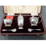 A 1960's Birmingham silver cruet set, makers name H. Perovetz, total weight without blue glass