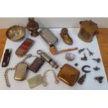 Small collectables to include vesta cases, a Metropolitan Police whistle, white metal charms and a